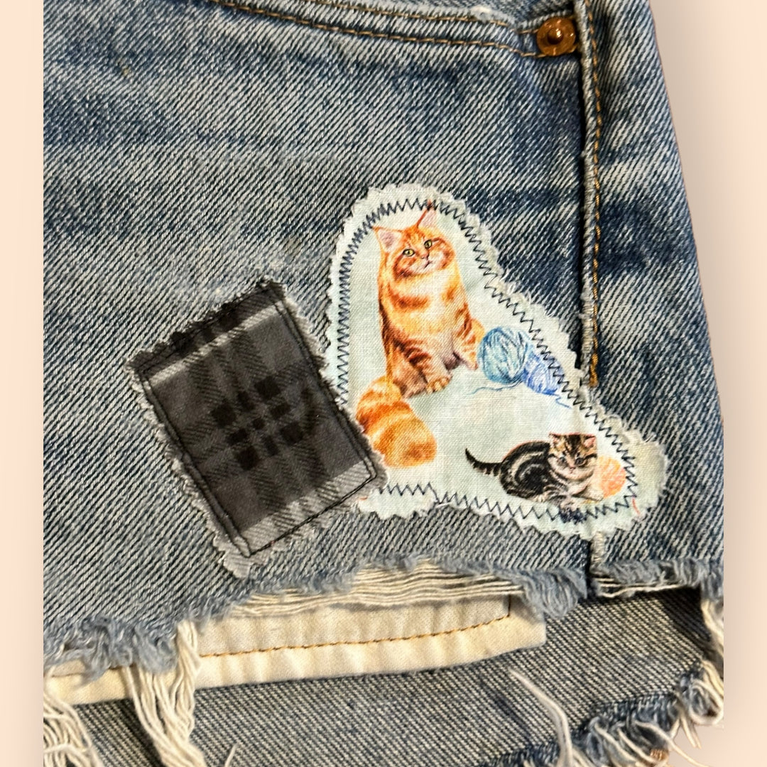 Levi's Distressed Cutoff Shorts With Handmade Kitty Patch